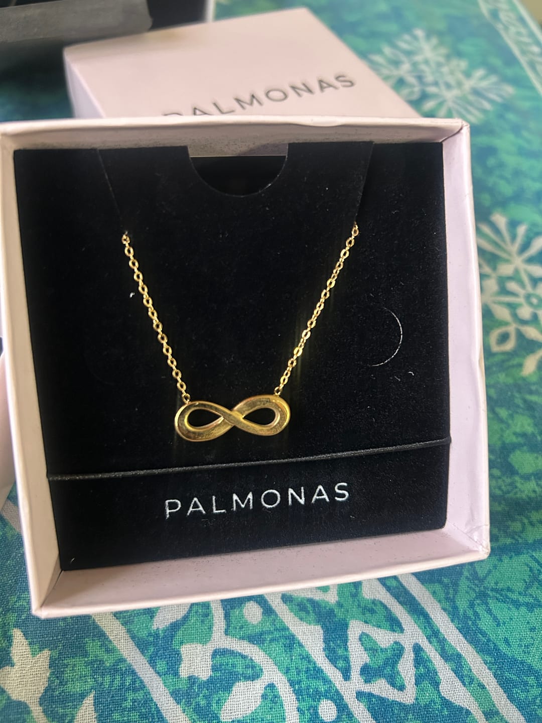 Customer photo review of Golden Infinity Necklace
