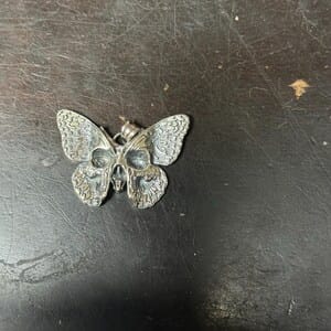 Customer photo review of Butterfly Skull Pendant