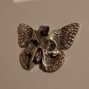 Customer photo review of Butterfly Skull Pendant