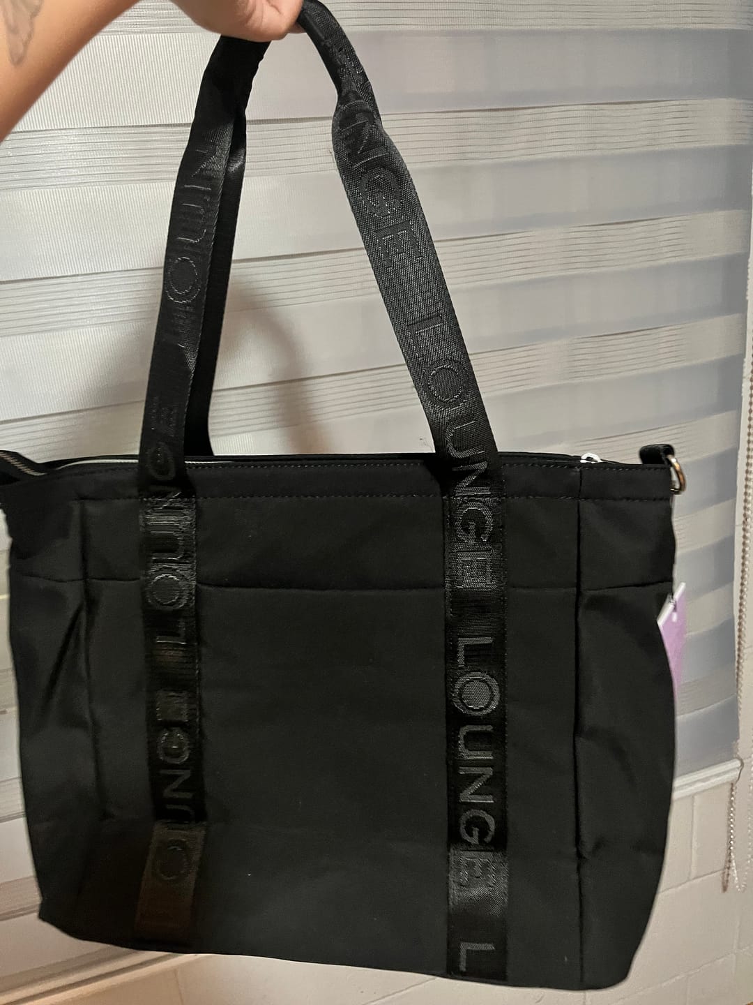 Customer photo review of Bolso Nylon Llavero Street