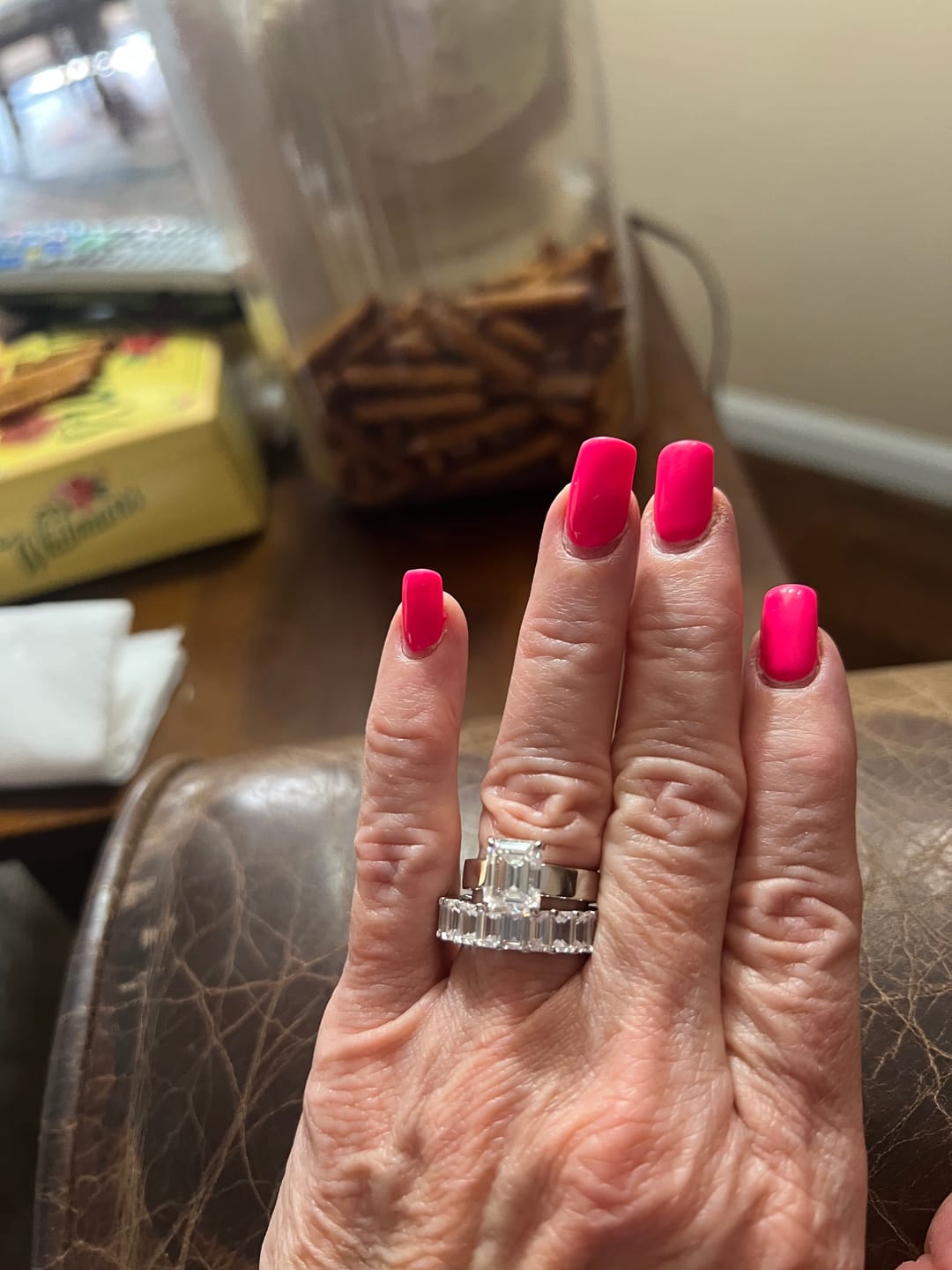Customer photo review of Solitaire Emerald Cut Moissanite Wide Band Engagement Ring