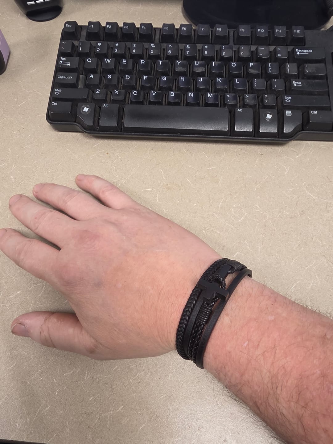 Customer photo review of Christianartworkshop Tri - Color Stainless Steel Cross & Braided Leather Fashion Bracelet