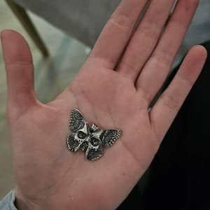 Customer photo review of Butterfly Skull Pendant