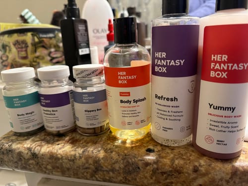 Customer's collection of Balance Bundle 2.0 products, including washes and supplements, lined up on a bathroom counter.