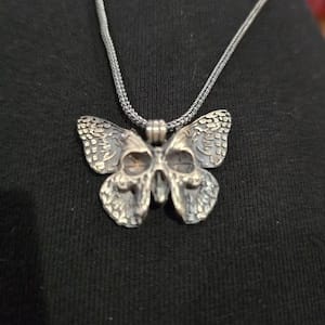 Customer photo review of Butterfly Skull Pendant