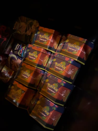 Customer photo review of (PRE-ORDER) Mega Charizard Tin - Styles May Vary