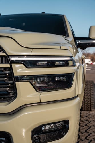 Reviewer's close-up of a beige custom truck, a giveaway prize for the LGND Membership.