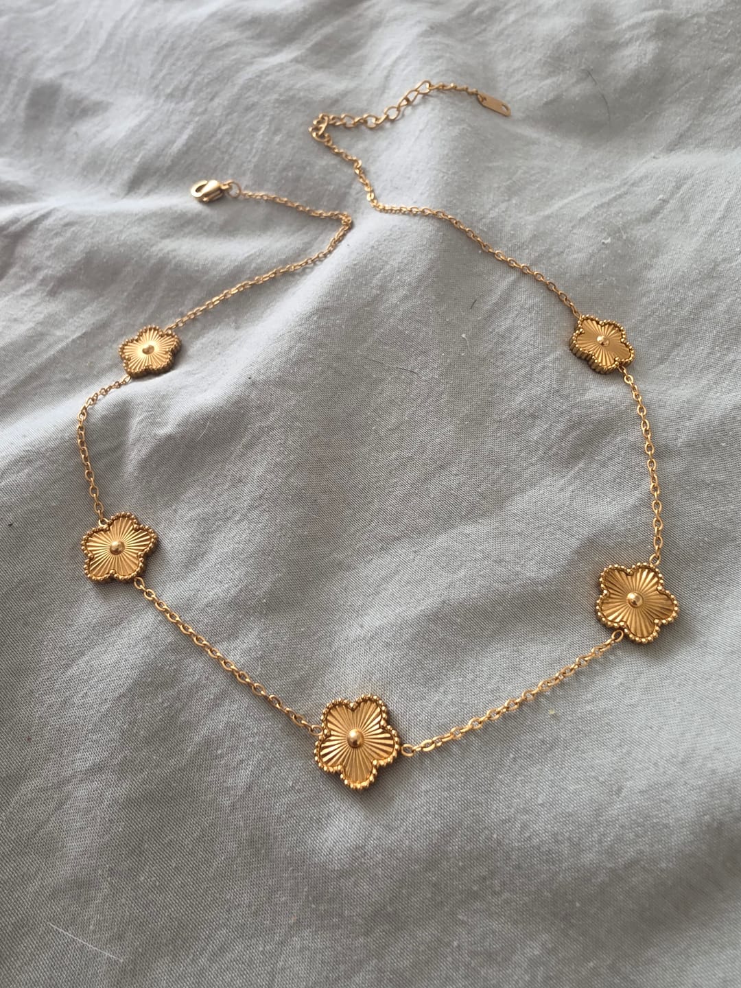 Customer photo review of Golden Clover Cluster Necklace