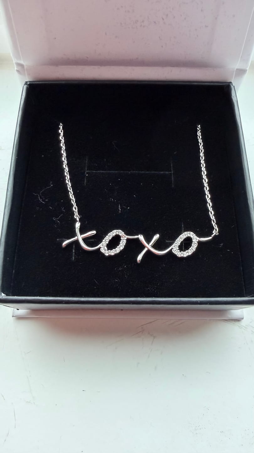 Customer photo review of Jocelyn 18k White Gold Plated XOXO Pendant Necklace with Swarovski Crystals