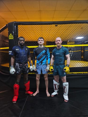 Customer photo review of Eryx Teal Distortion Hybrid MMA Shorts