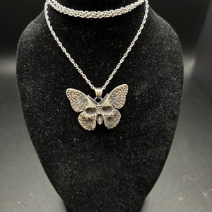Customer photo review of Butterfly Skull Pendant