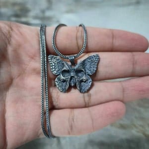 Customer photo review of Butterfly Skull Pendant