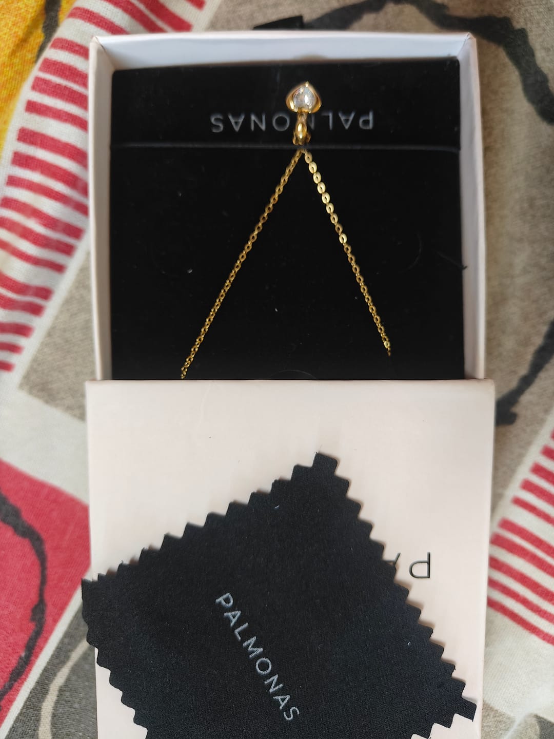Customer photo review of Twin Glow Heart Necklace