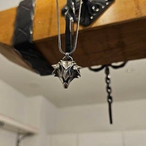 Customer photo review of Griffin Pendant
