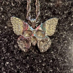Customer photo review of Butterfly Skull Pendant