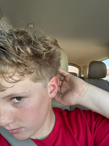 Reviewer showing their textured hair styled with the Hair Clay.