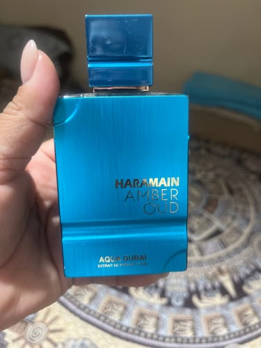 Reseña con foto de un cliente sobre Perfume Al Haramain Amber Oud Aqua Dubai XDP Unisex