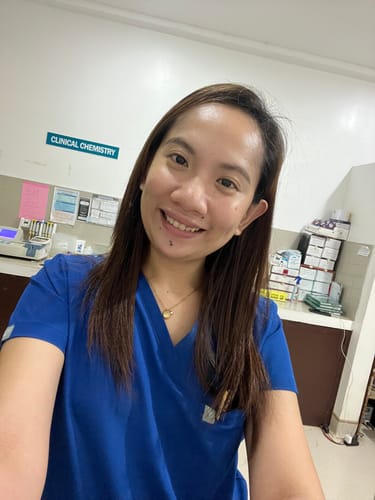 Customer photo review of 5-Pocket MoveTech® Scrub Top - Women / Cobalt Blue