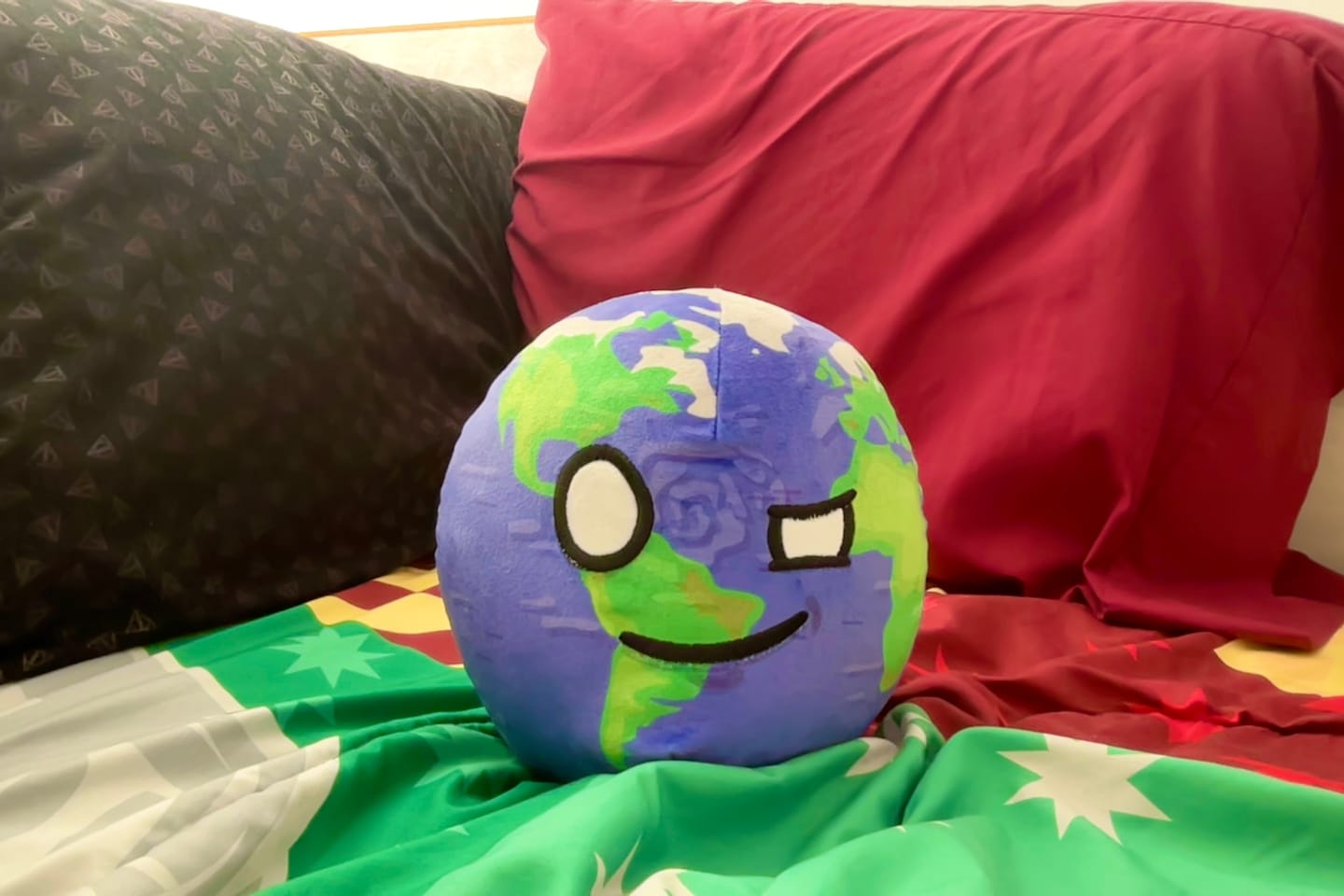 Customer photo review of The SolarBalls Earth Plush