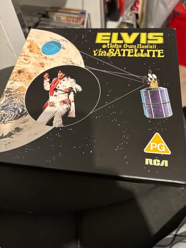 Customer's 'Elvis Aloha from Hawaii Via Satellite' box set, showcasing the space-themed cover.