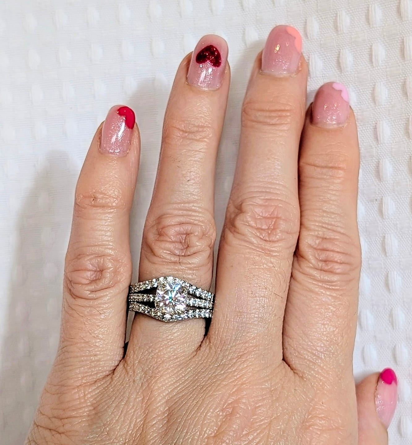 Customer photo review of S925 Vintage Insert 0.9 Round Cut Wedding Band Engagement Ring Enhancer In Sterling Silver
