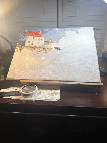 Customer's Rowboat by the Shore paint by numbers canvas in progress, with only the house section partially painted.