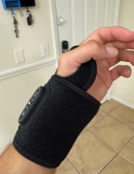 Customer photo review of WarmRelief™ Wrist Heat & Vibration Pad