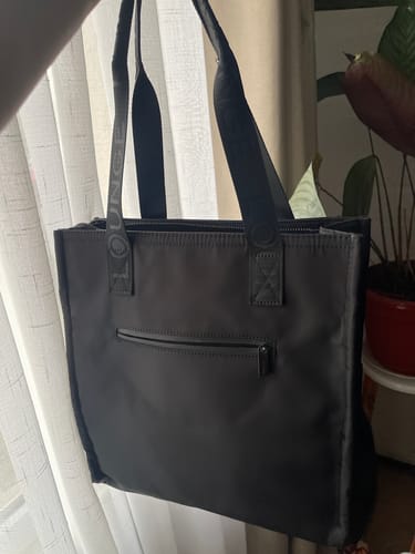 Reseña con foto de un cliente sobre Cartera De Hombro Para Notebook