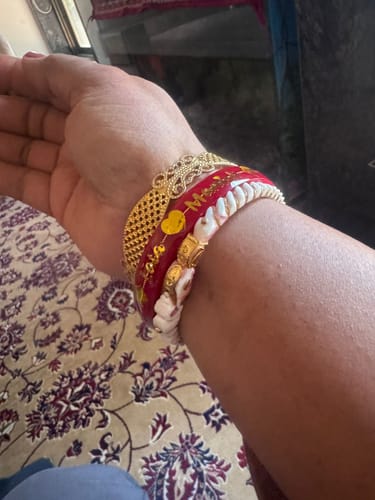 Customer photo review of Anmol Bandhan Gold Bangles –  Love & Togetherness crafted in Gold