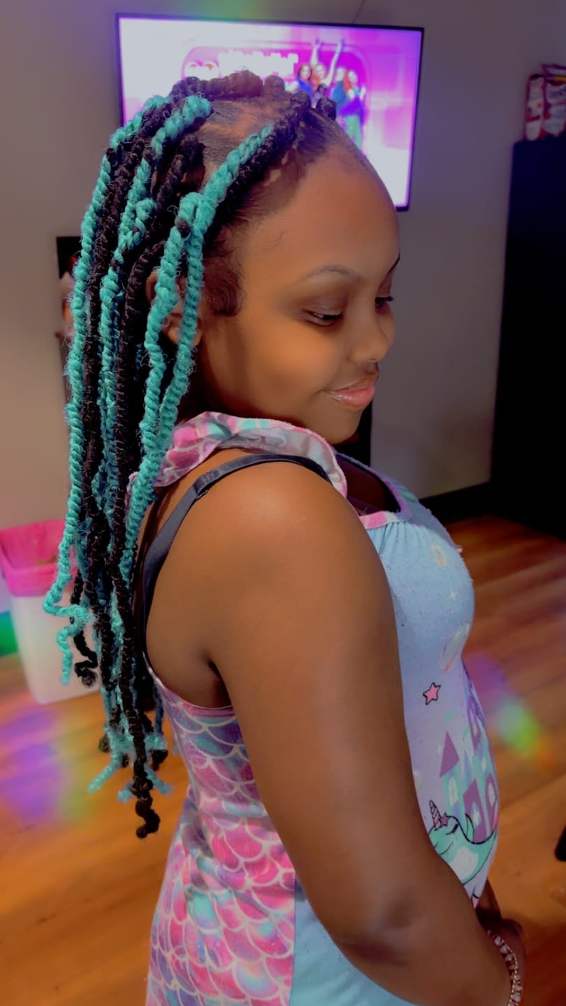Customer photo review of Outre X-Pression Twisted Up Crochet Braid - 3X SPRINGY AFRO TWIST 16"