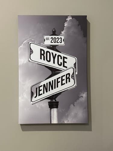 Customer's black-and-white canvas print of street signs with the names 'Royce' and 'Jennifer' and 'EST. 2023'.