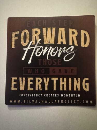 Customer's sticker from the T.V.P. Elite Membership, reading "Each step forward honors those who gave everything".