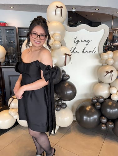 Customer photo review of Arabella Bow Dress in Black by Bariano - RENTAL