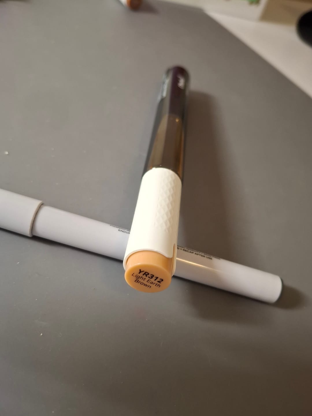 Customer photo review of Ohuhu Marker Ink YR312 / E110 Refill for Alcohol marker