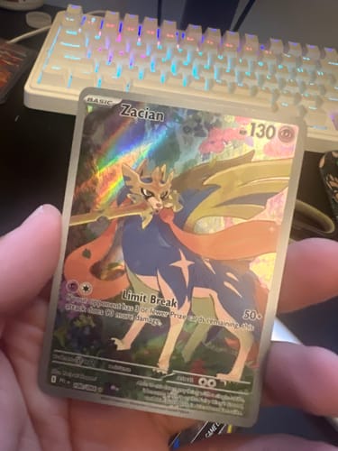 Customer photo review of Pokemon Mega Charizard Tin (LIMIT 2)