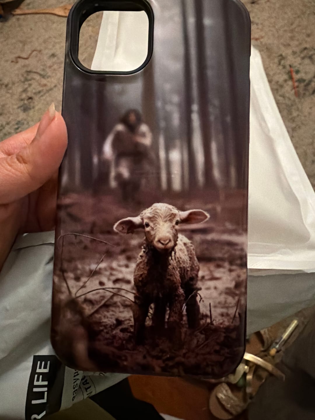 Customer photo review of Jesus With The Sheep, Jesus Running After Lamb, Phone Case