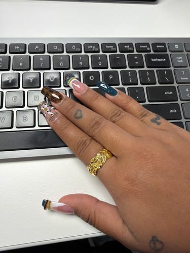 Customer photo review of Alaka'i Hibiscus Heirloom Cutout Ring