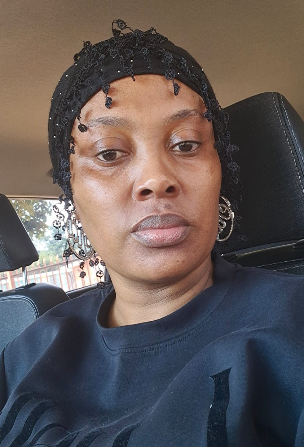 Customer photo review of Silver Luxe Logo Hoops