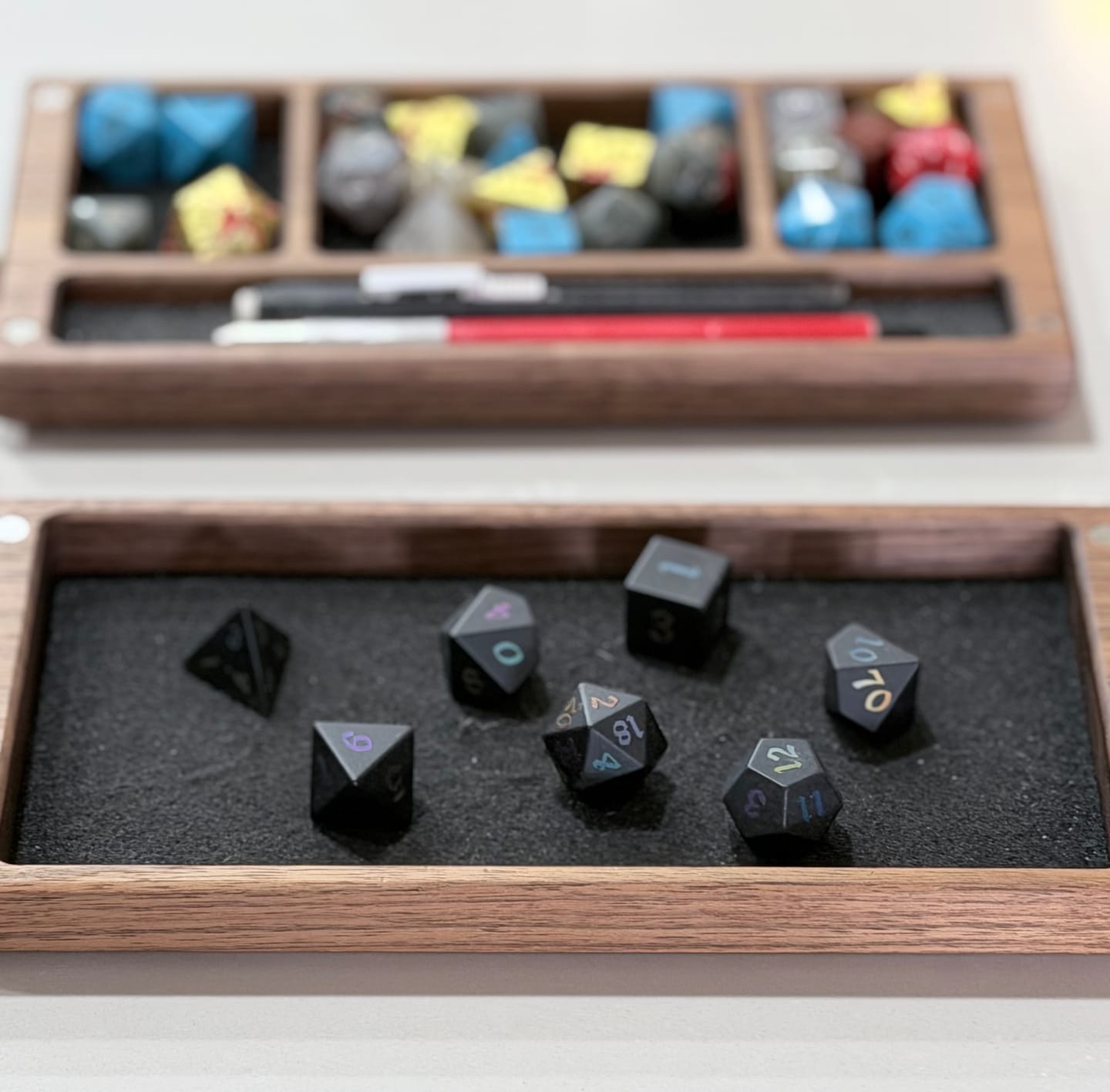 Customer photo review of Inked Black Night Raised Obsidian Hand Carved Dice DND Set