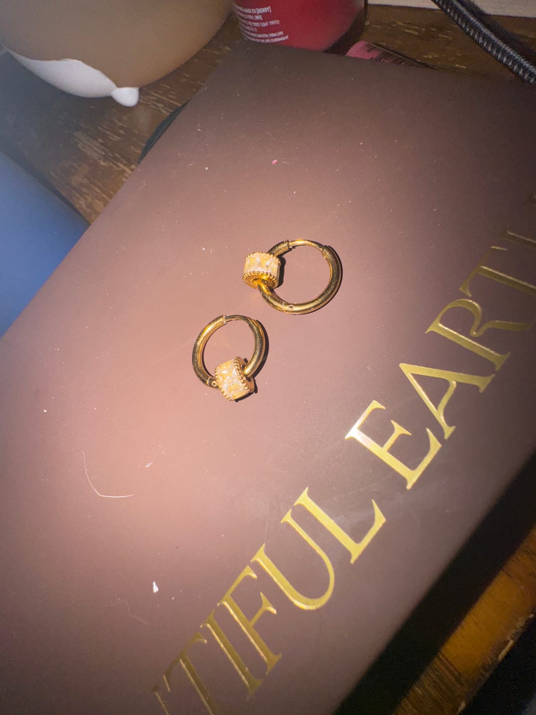 Customer photo review of Gigi Crystal 18K Gold Hoop Earrings