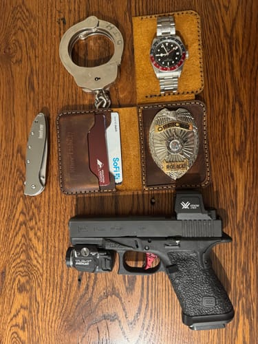 Customer photo review of Minimalist Badge Wallet