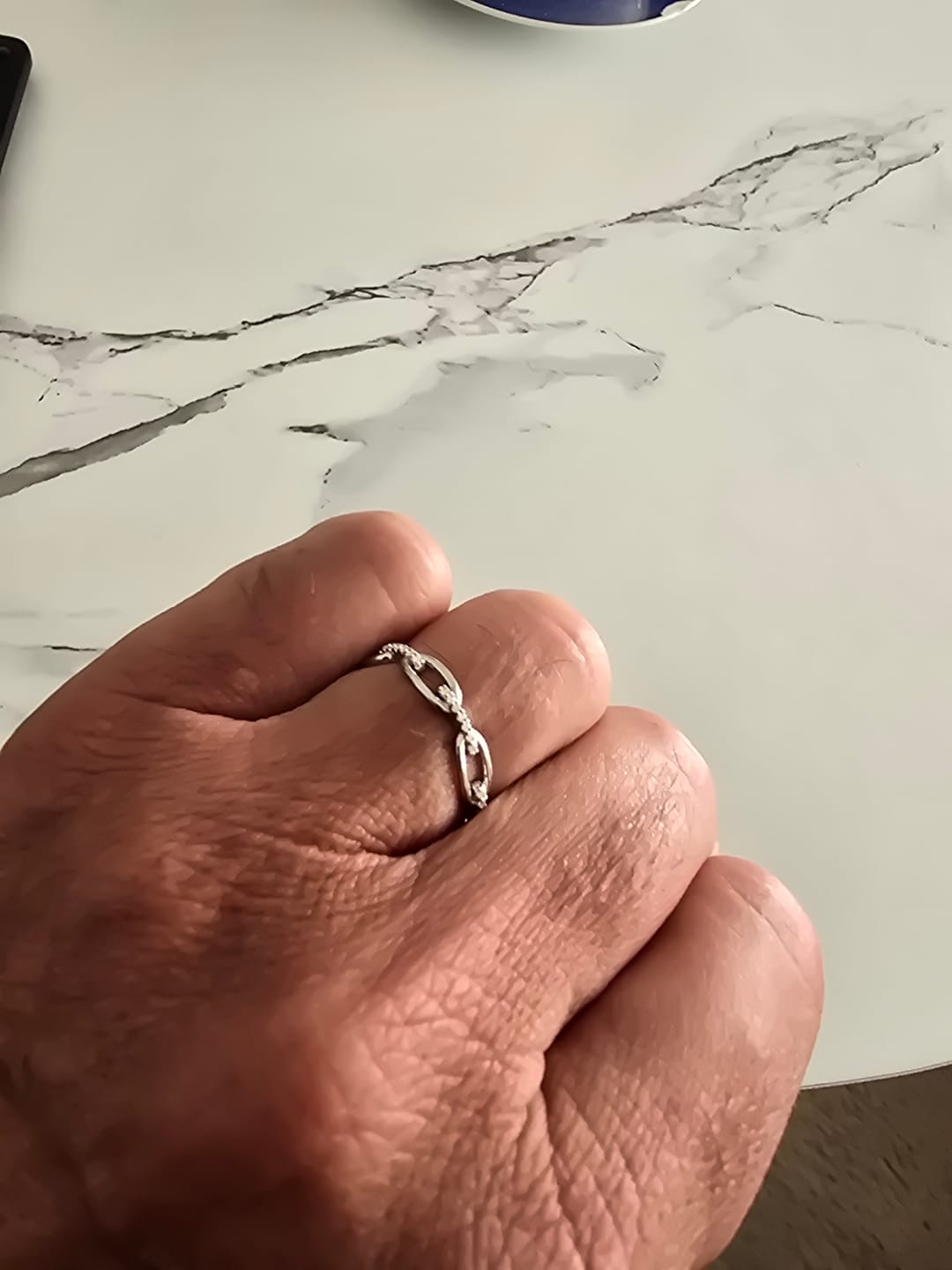 Customer photo review of MOISSANITE ICED CHAIN RING.