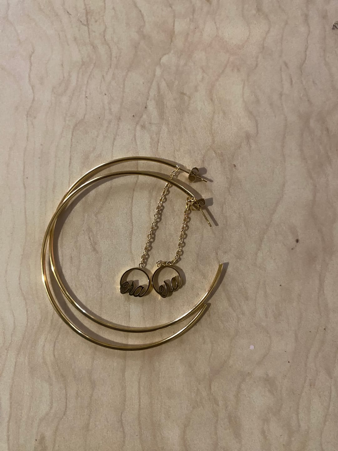 Customer photo review of Gold Era Drop Hoops