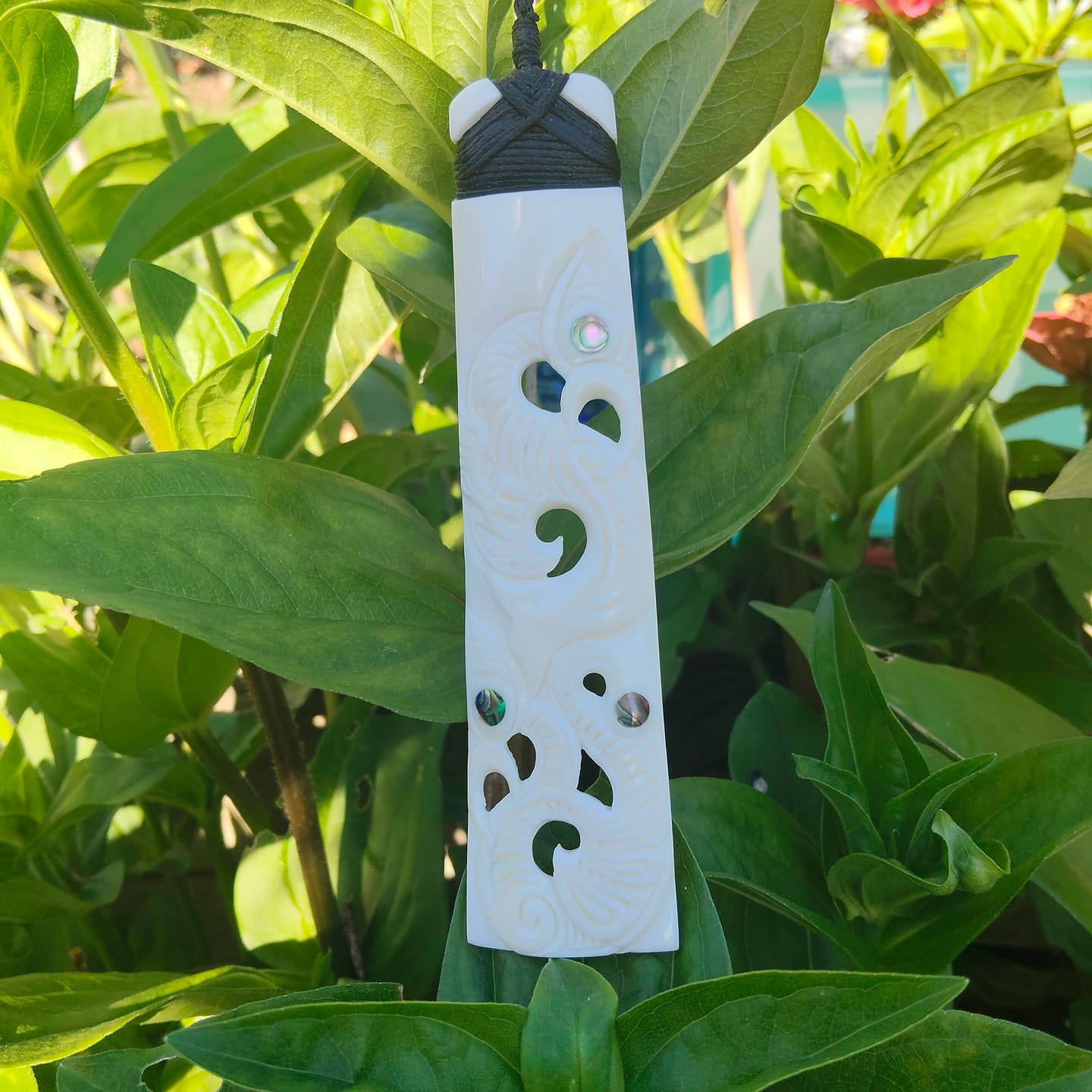 Customer photo review of Maori Long Bone Double Manaia Toki Necklace