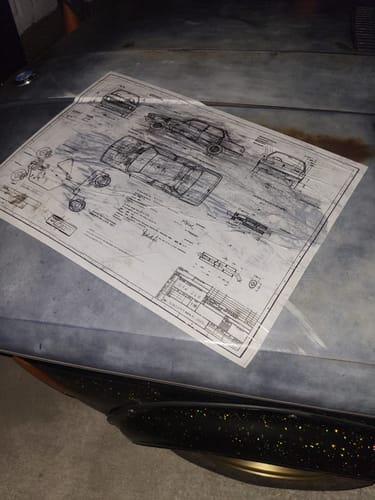 Customer applied a glossy car blueprint onto a metal car hood using Maker's Magic Gloss.