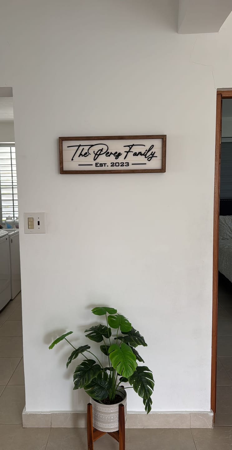 Customer photo review of Framed Family Name Sign