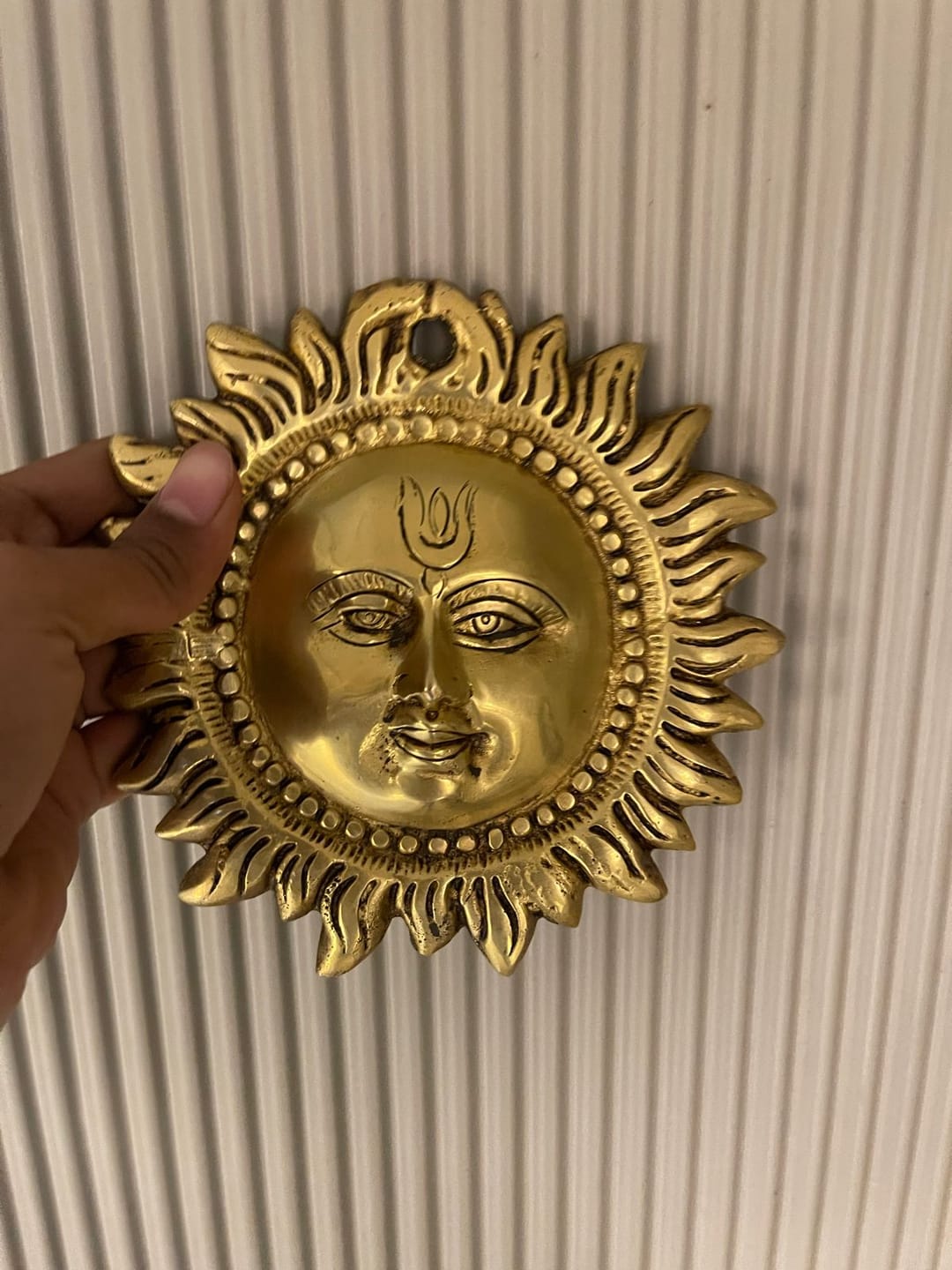 Customer photo review of Brass Vastu Sun Wall Hanging Idol Vastu Remedy for East Direction Balance, Fame and Positive Energy for Home, Office and Entrance Decor | 15 x 15 cm | 940 gm