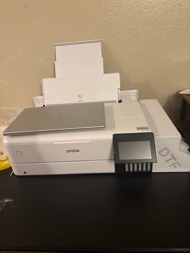 Customer's DTF Ciss bundle installed on a white Epson printer, with a laptop resting on top.