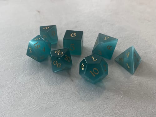 Customer photo review of Gemstone Aquamarine Cats Eye Stone Hand Carved DND Dice Set