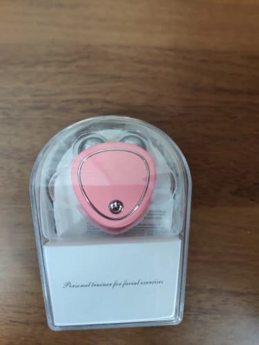 Customer photo review of Electric Micro-Current Face Massager for Firming and Slimming